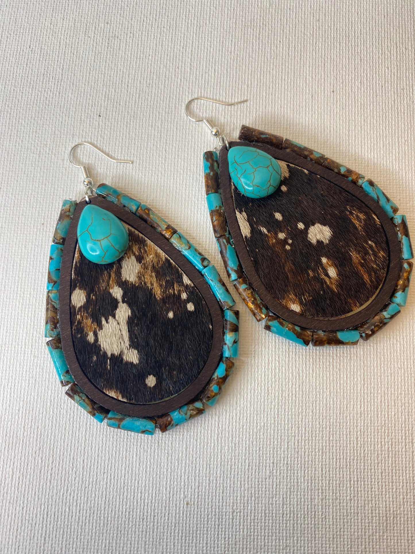 cowhide earrings with turquoise beads