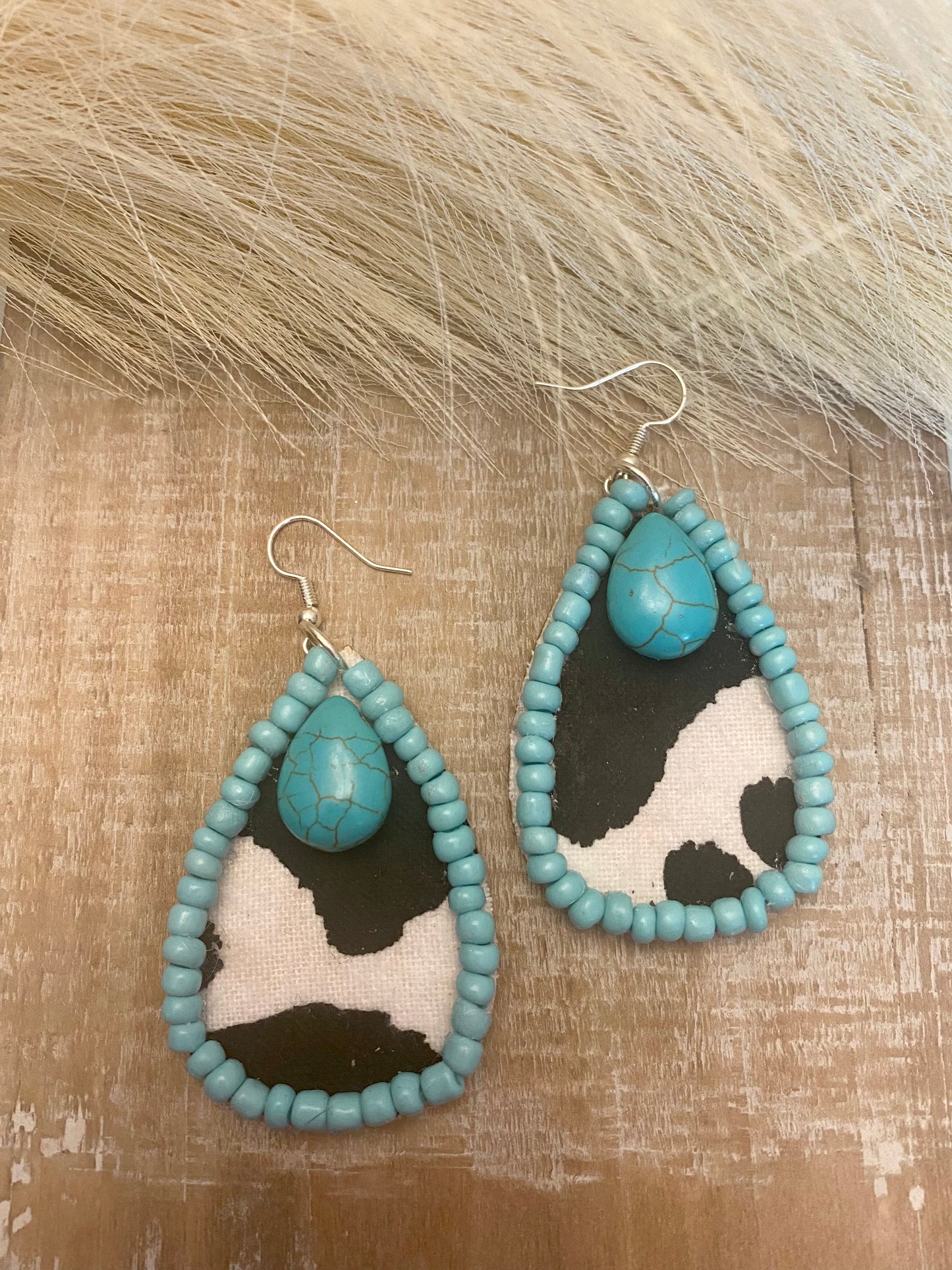 mad hippie cow earrings