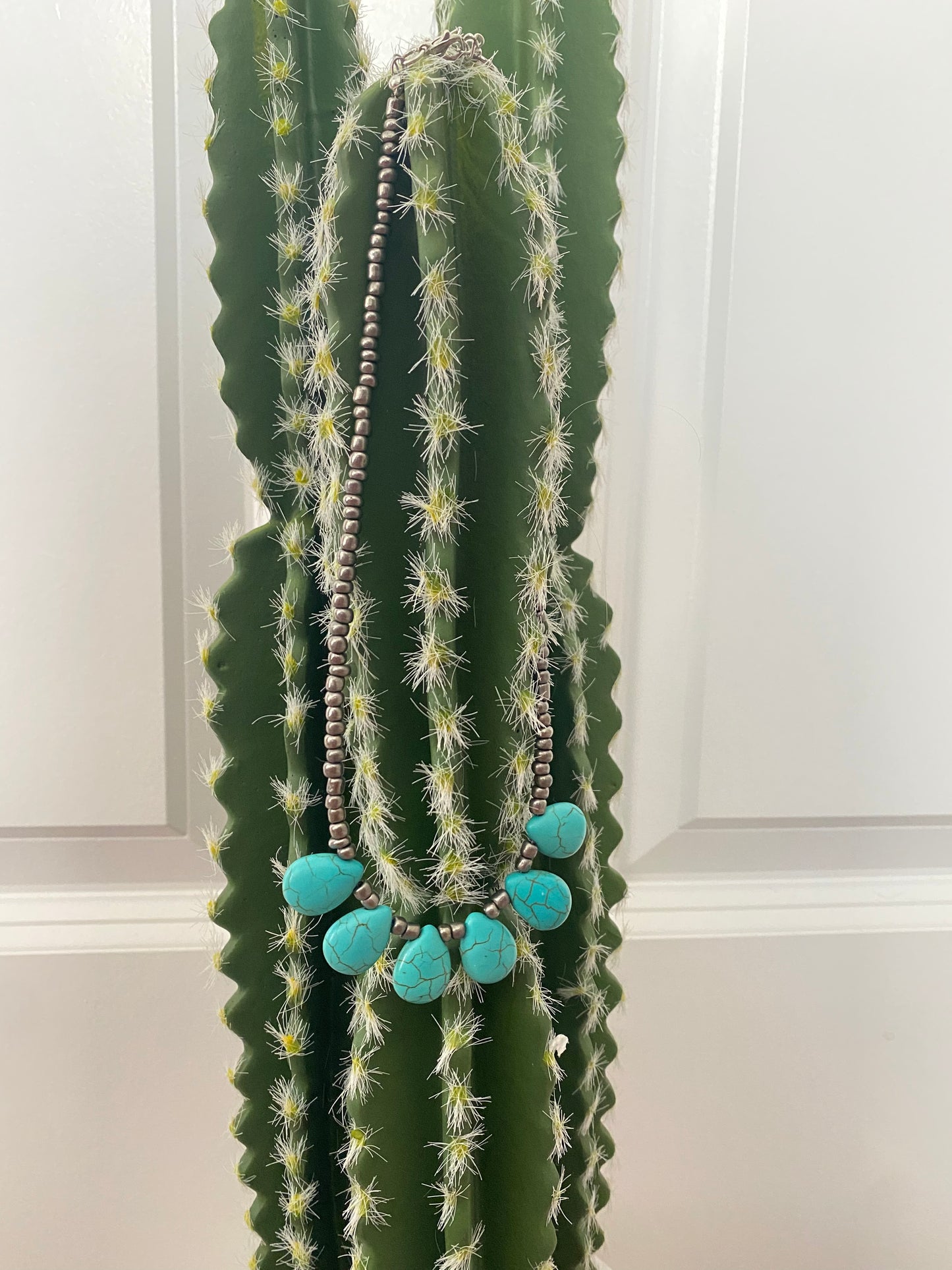 Teardrop turquoise necklace with silver beads